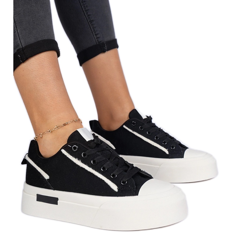 Black women's fabric sneakers on the platform