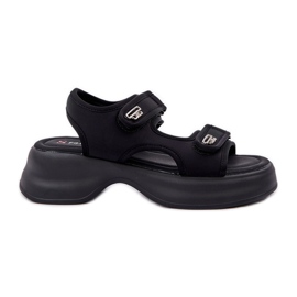 Material light sandals on the black platform Material light sandals on the black platform