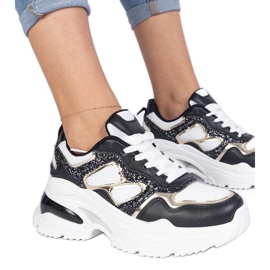Black women's sneakers decorated with glitter Black women's sneakers decorated with glitter