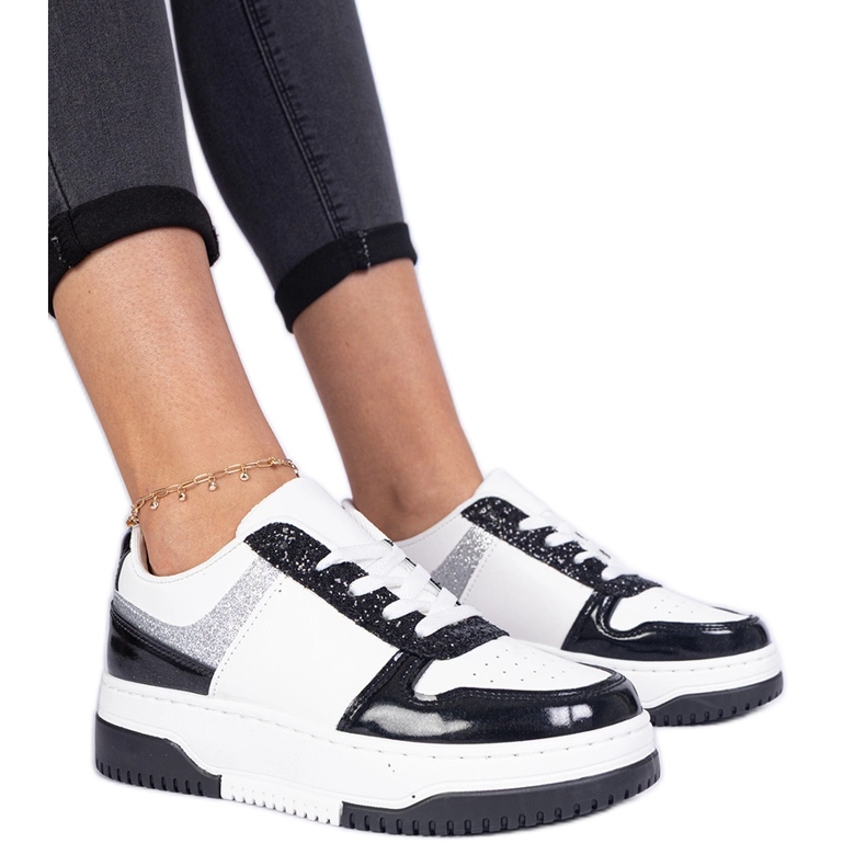Black women's sneakers with a thick sole Black women's sneakers with a thick sole