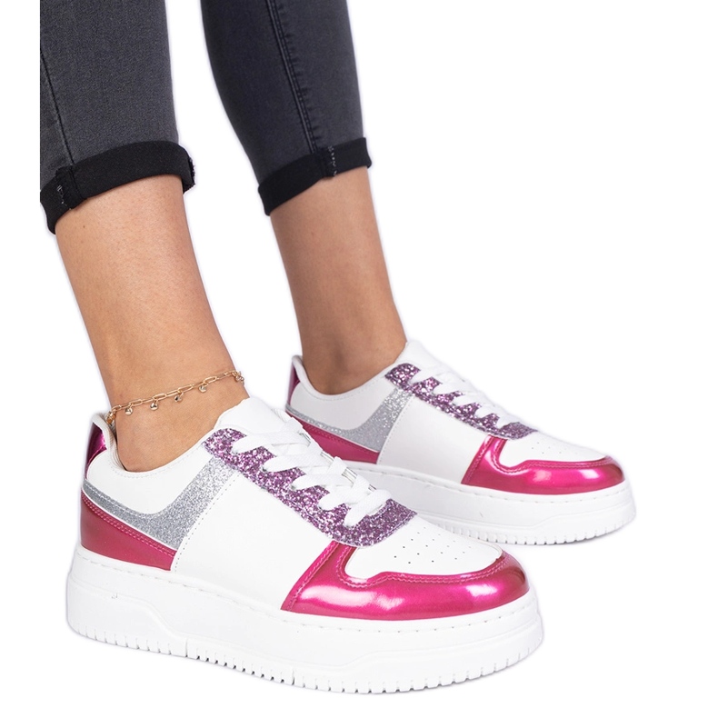 Pink women's sneakers on a thick sole