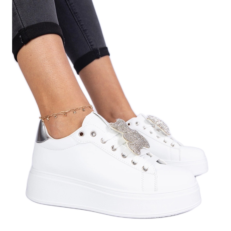 White and silver women's sneakers decorated with teddy bear White and silver women's sneakers decorated with teddy bear