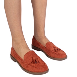 Orange women's moccasins from Ekozamsz with fringes