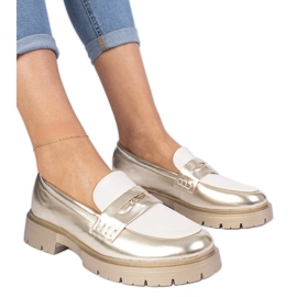 Golden women's loafers with a white insert