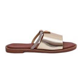 Eco leather flat heels with a decorative gold strap golden