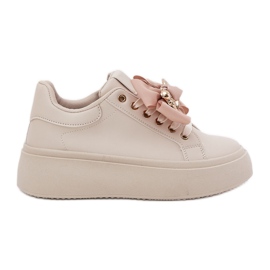Women's sneakers with a bow and a brooch with a beige teddy bear