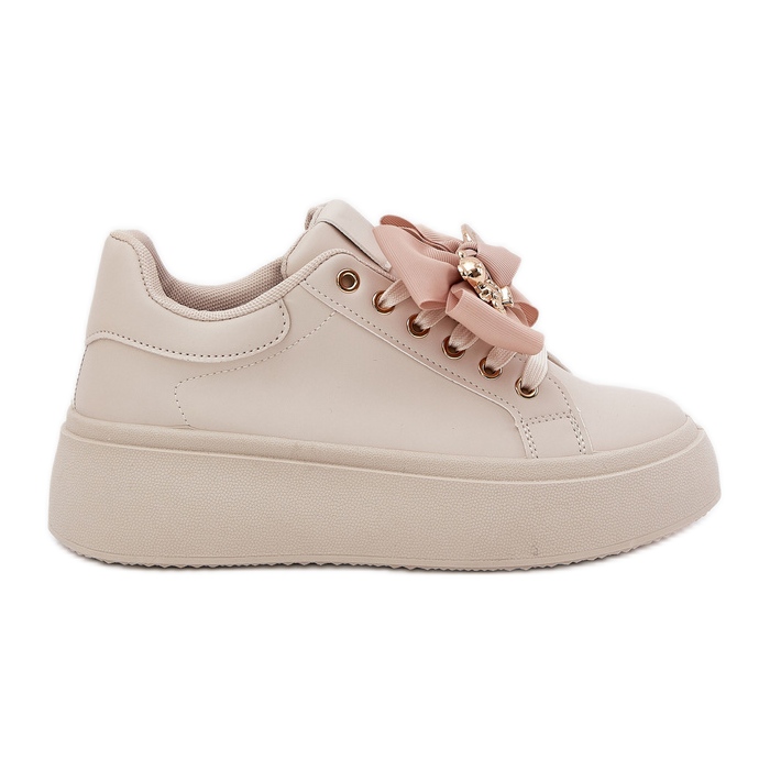 Women's sneakers with a bow and a brooch with a beige teddy bear