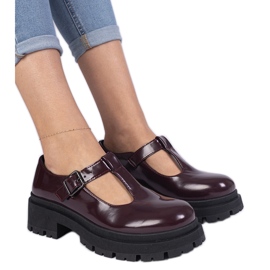Burgundy shoes on the eco -leather platform red