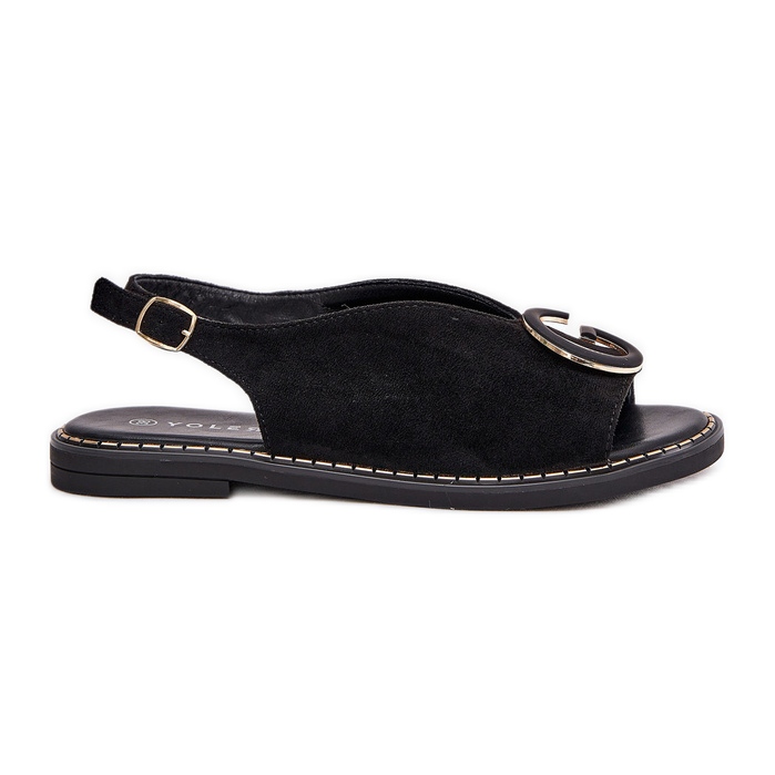 Flat sandals with black decoration