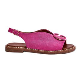 Flat sandals with a pink decoration