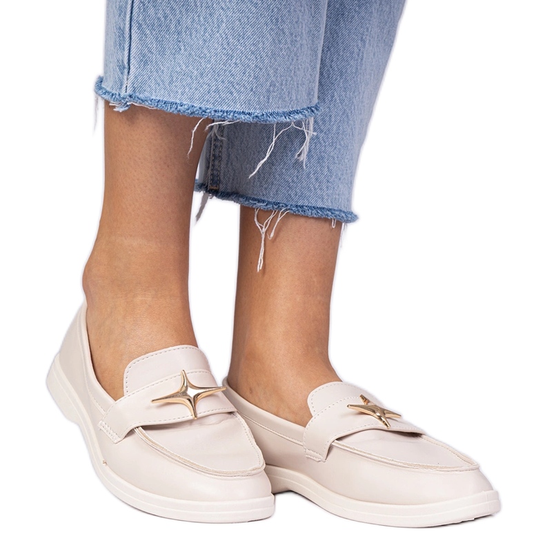Beige women's loafers with a golden decoration Beige women's loafers with a golden decoration