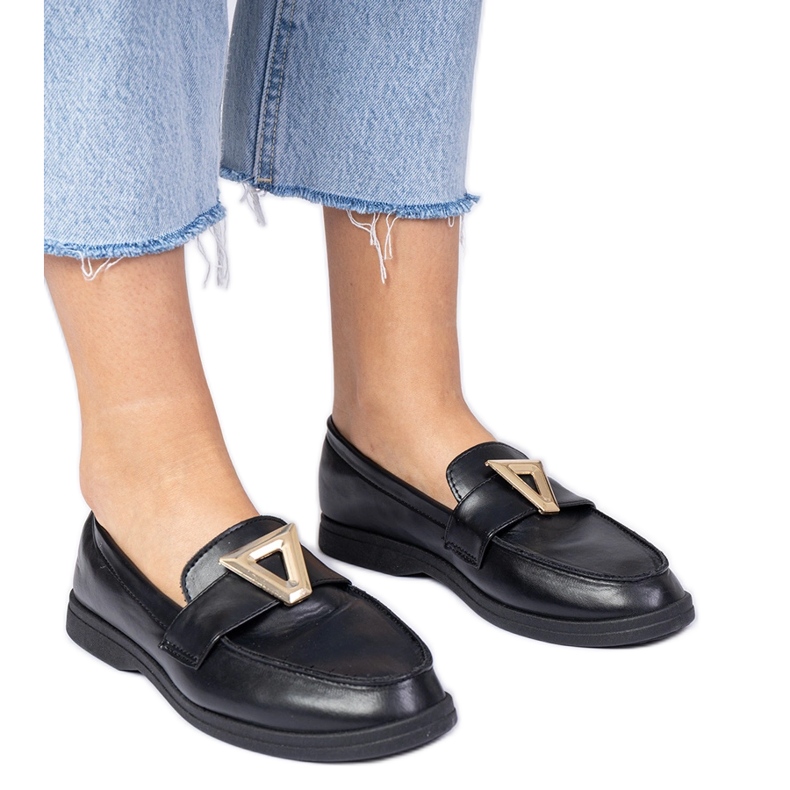 Black women's loafers with an elegant decoration