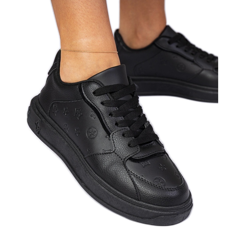 Black sports sneakers from eco -leather
