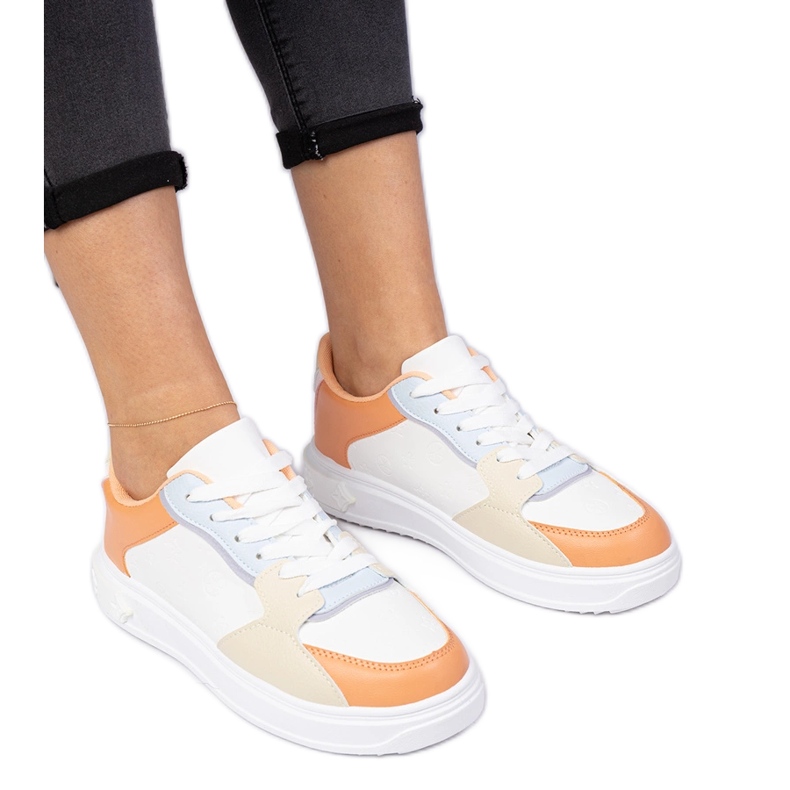 White-orange sports sneakers from eco-leather