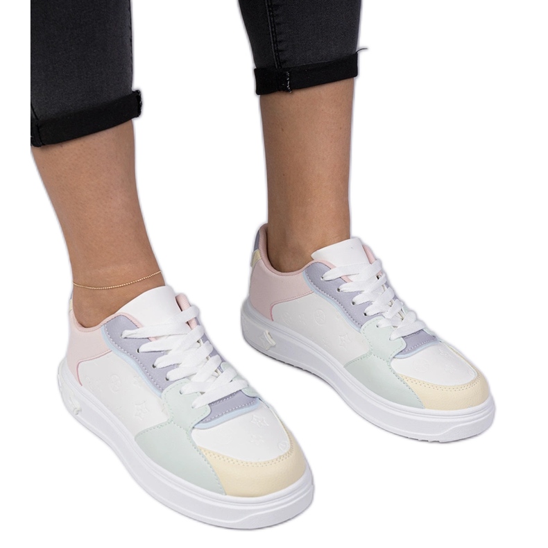 White and blue sports sneakers from eco-leather