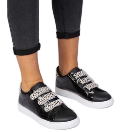 Black sneakers with animal Velcro finish