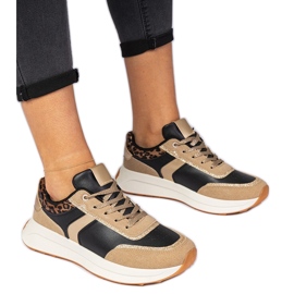 Black women's sneakers with glitter with an animal pattern