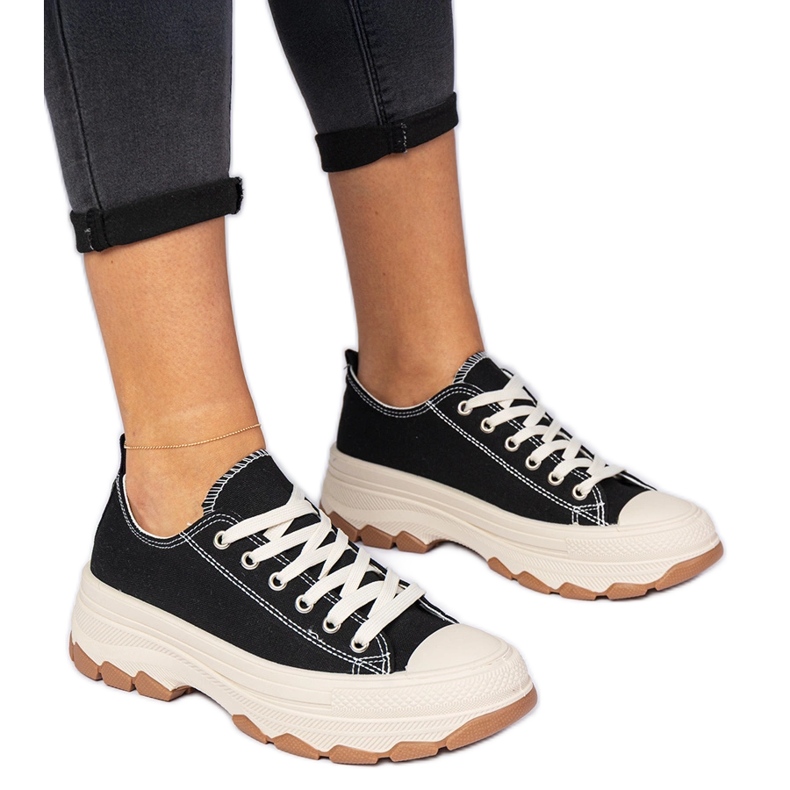 Black sneakers with a thick sole