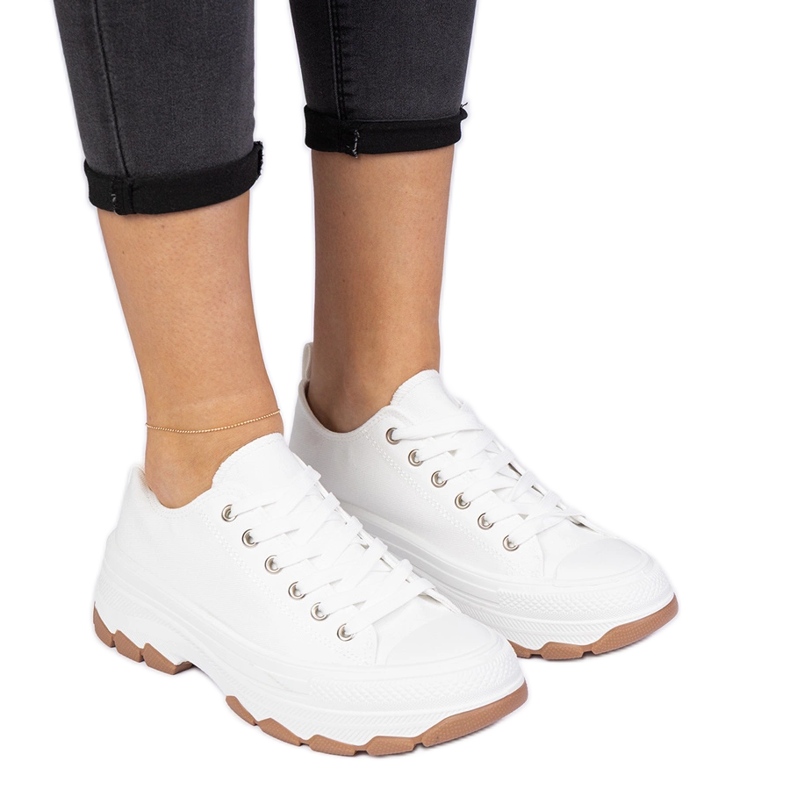 White sneakers with a thick sole