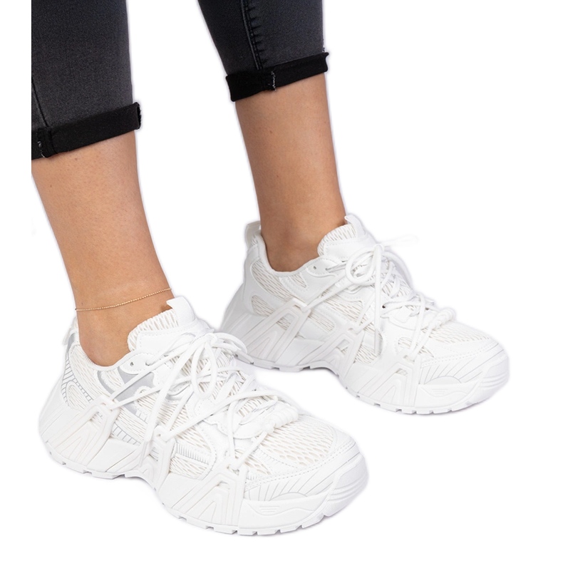 White sneakers stylish on a massive sole