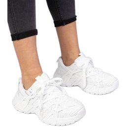White sneakers on a massive sole