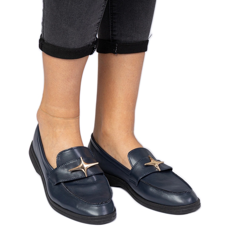 Navy womenal moccasins with a golden decoration blue