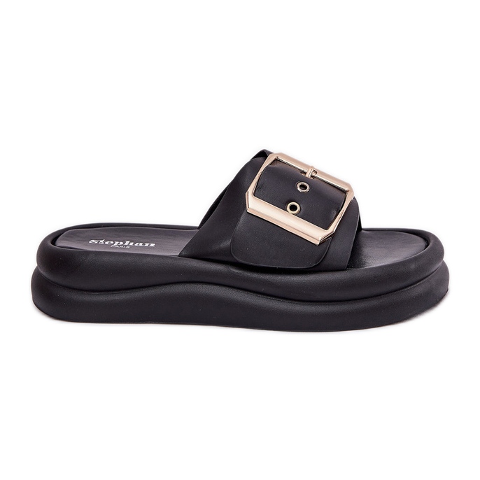 Women's slippers on a massive platform with a decorative black buckle