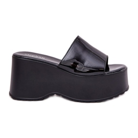 Painted women's slippers on the platform and black wedges