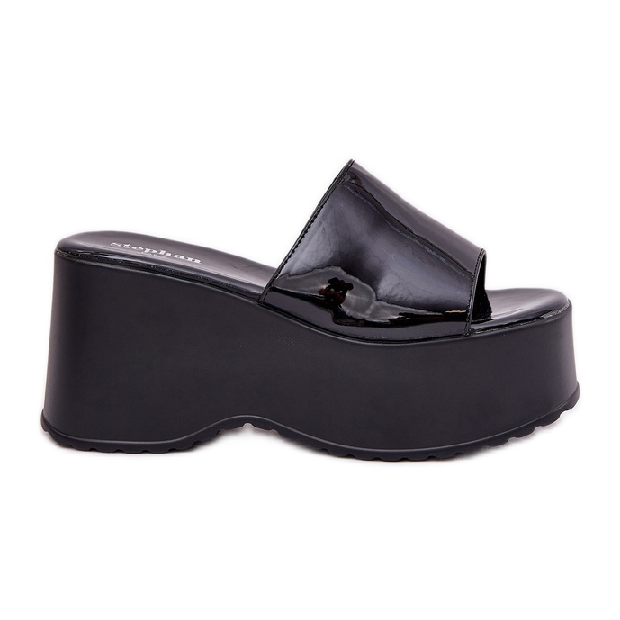 Painted women's slippers on the platform and black wedges