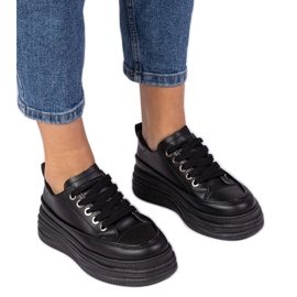 Black women's sneakers on a high sole