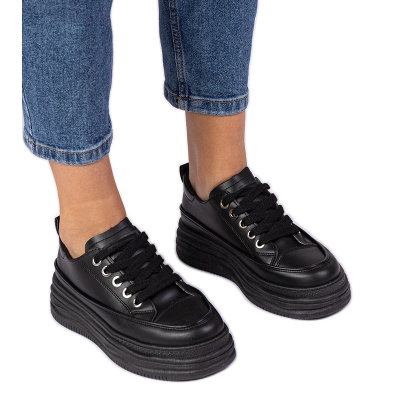 Black women's sneakers on a high sole