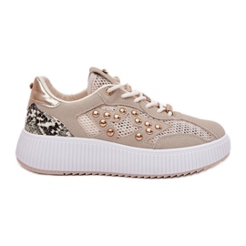 Women's sports shoes with mesh and beige studs Women's sports shoes with mesh and beige studs