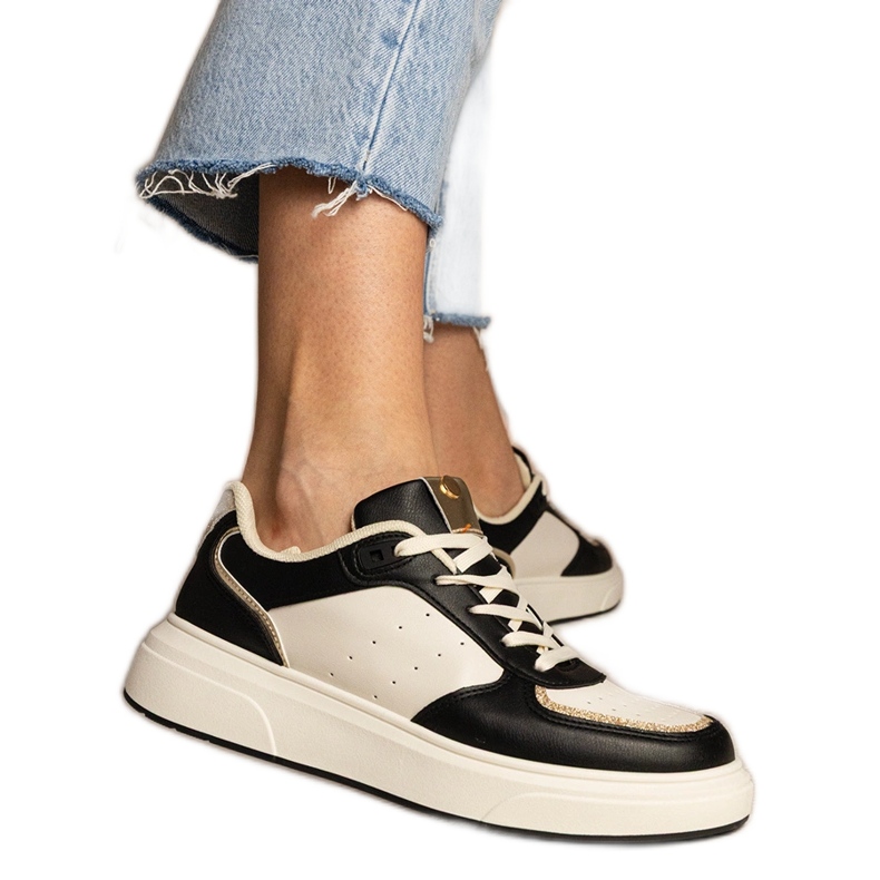 Black women's sneakers with a glitter accessory