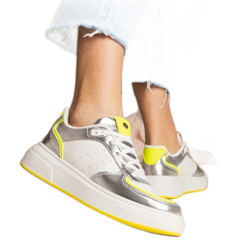 Silver women's sneakers with a neon accessory Silver women's sneakers with a neon accessory