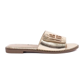 Goodin Golden women's flip flops with a flat sole with an ornament