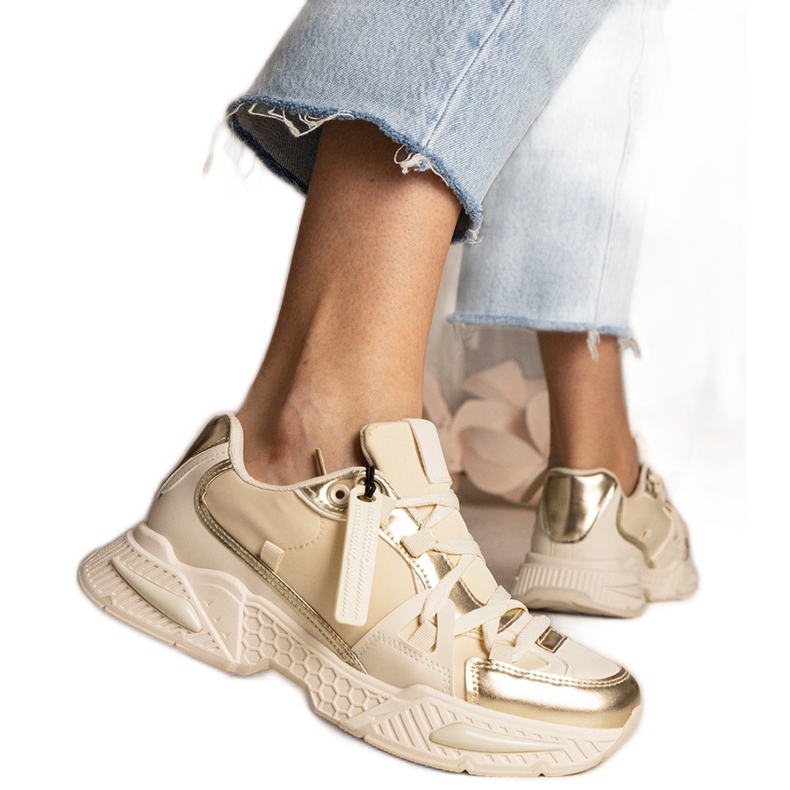 Beige women's sneakers on a massive sole
