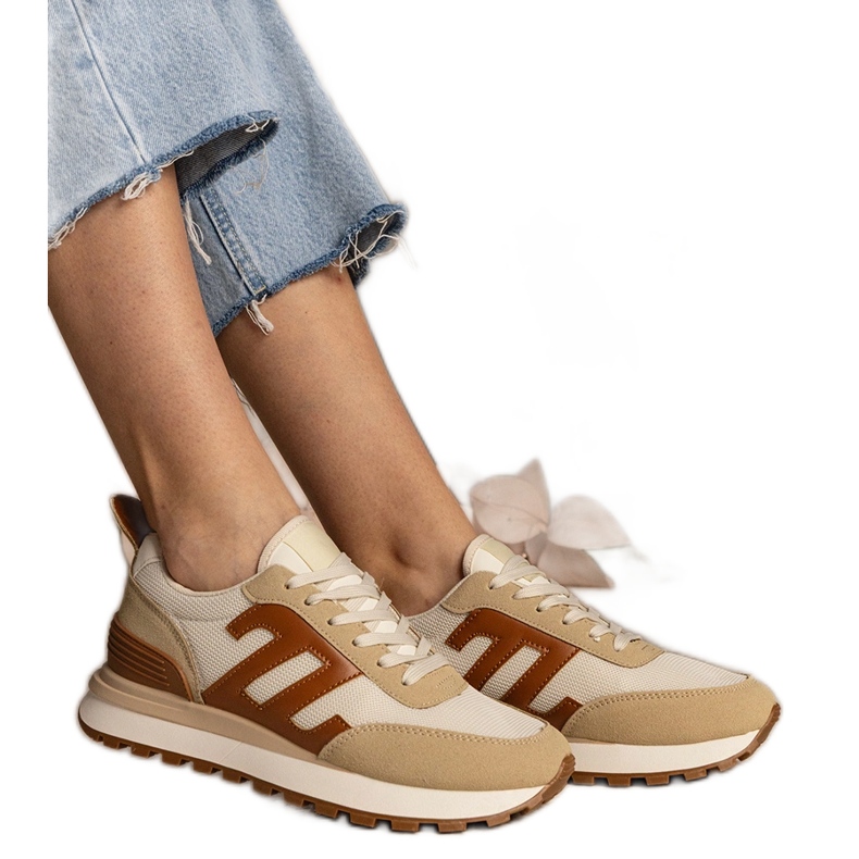 Beige women's sports sneakers