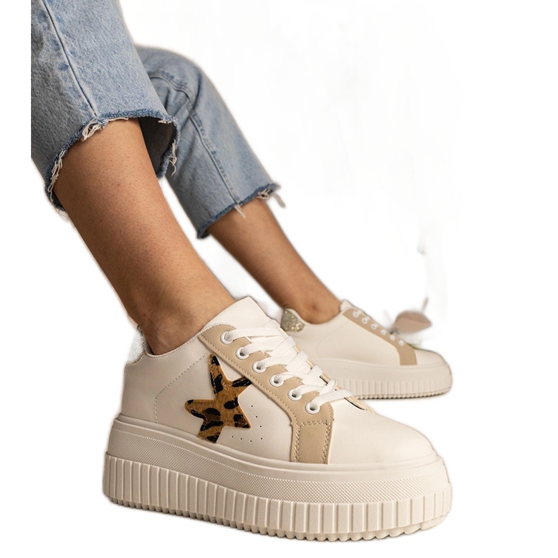White and beige sneakers decorated with glitter and star