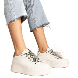 White women's sneakers with massive lacing