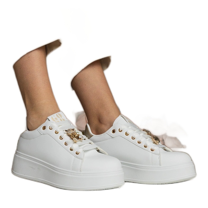 Women's white and gold sneakers decorated with stones Women's white and gold sneakers decorated with stones