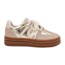 Women's sneakers on the platform with beige-gold decorations Women's sneakers on the platform with beige-gold decorations