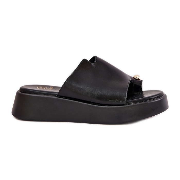 Women's flip flops on the platform and low wedges with a decorative detail black