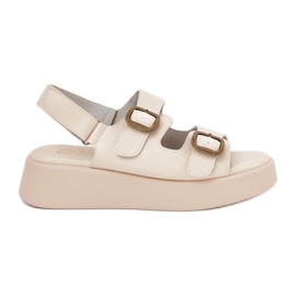 Women's sandals on platform and wedges with buckle beige