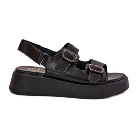 Women's sandals on platform and wedges with black buckles