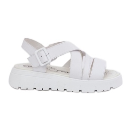 Women's leather sandals on the platform with a white buckle Women's leather sandals on the platform with a white buckle