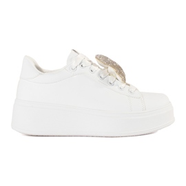 White sneakers on a teddy bear platform White sneakers on a teddy bear platform