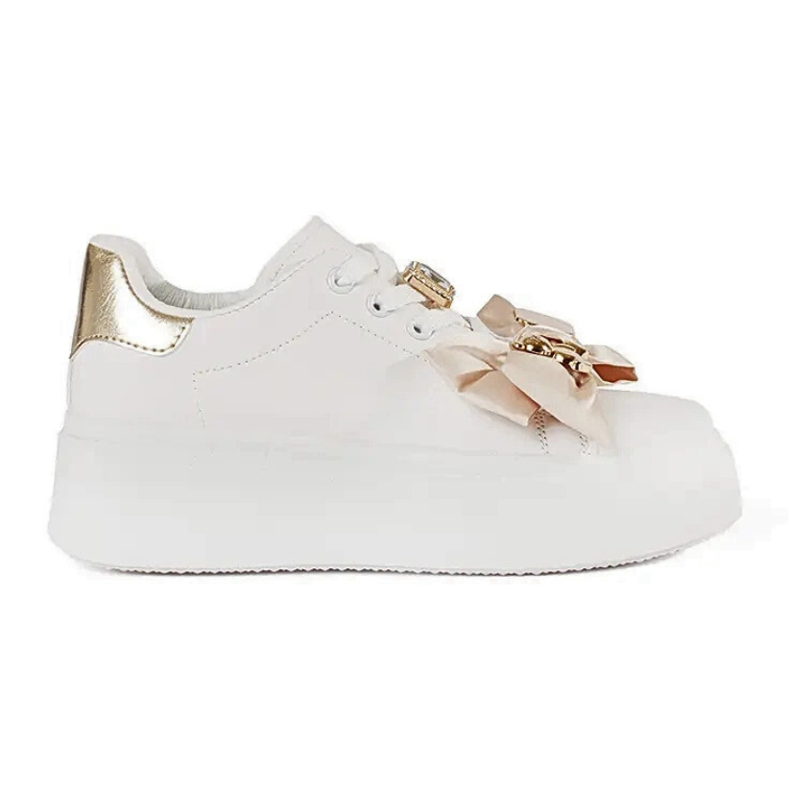 White and gold sneakers with golden additions White and gold sneakers with golden additions