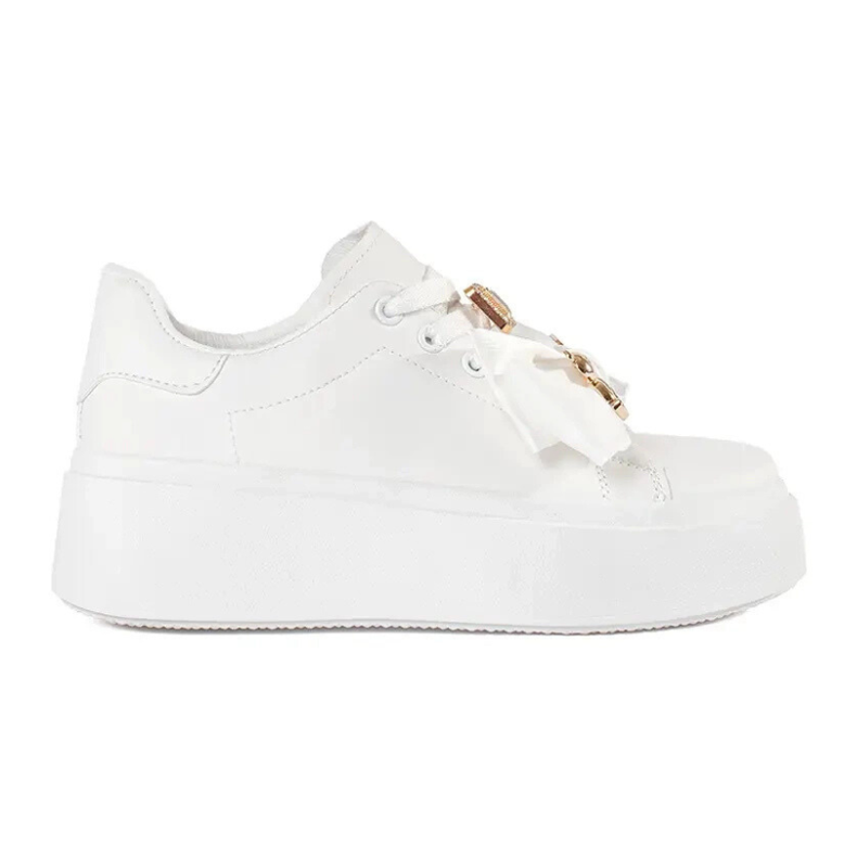 White sneakers with golden additions