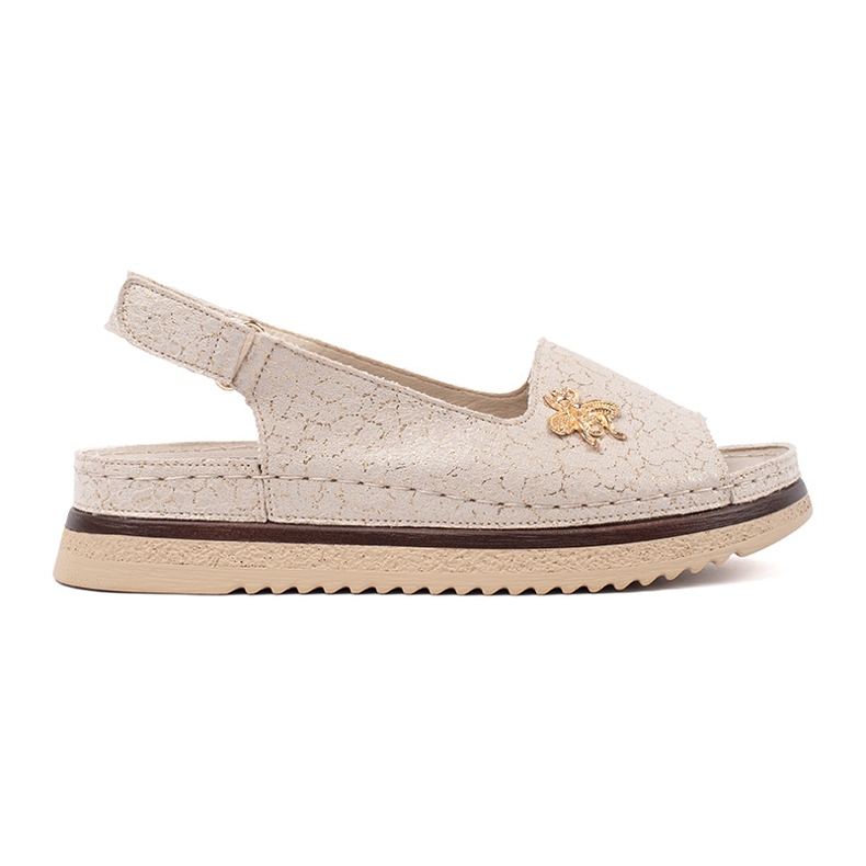 Goodin Beige sandals on the platform with a pin