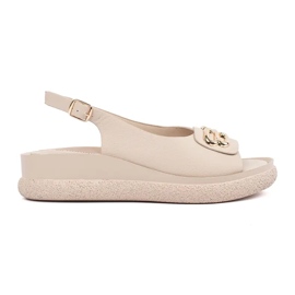Goodin Beige flat sandals with an ornament